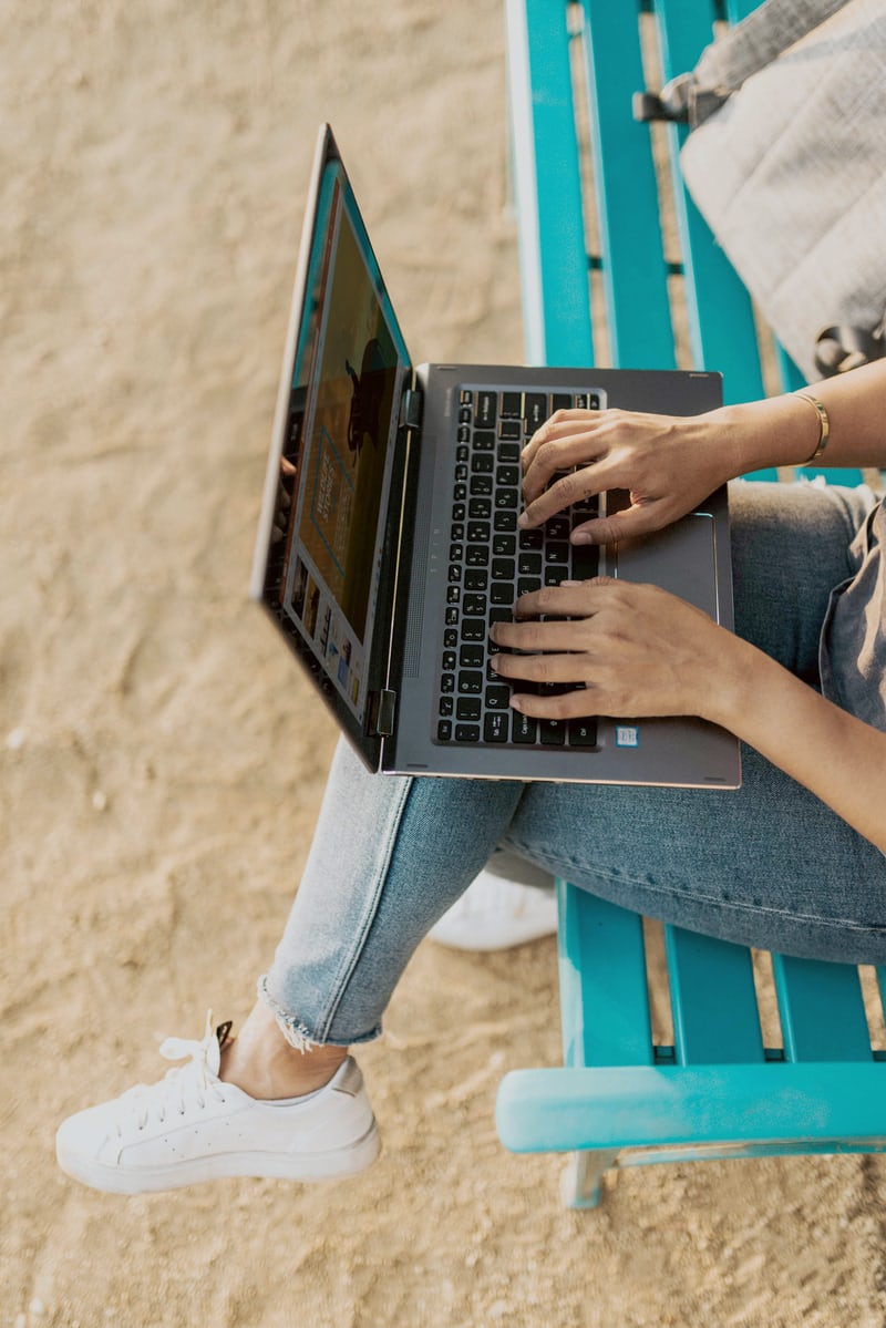 Girl using laptop.